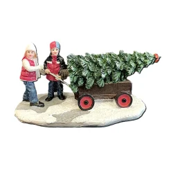 Kerstdorp kinderen met kerstboom