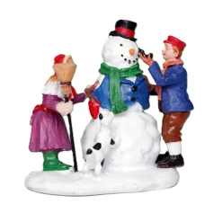 Kerstdorp sneeuwman maken